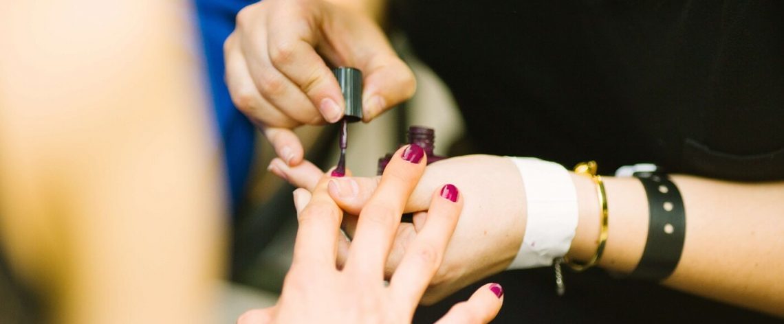 beauty salon applying nail polish