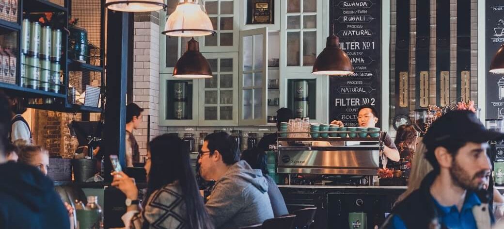 Photo of a cafe full of people