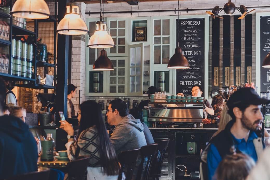 Photo of a cafe full of people