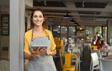 restaurant owner waiting to take your order